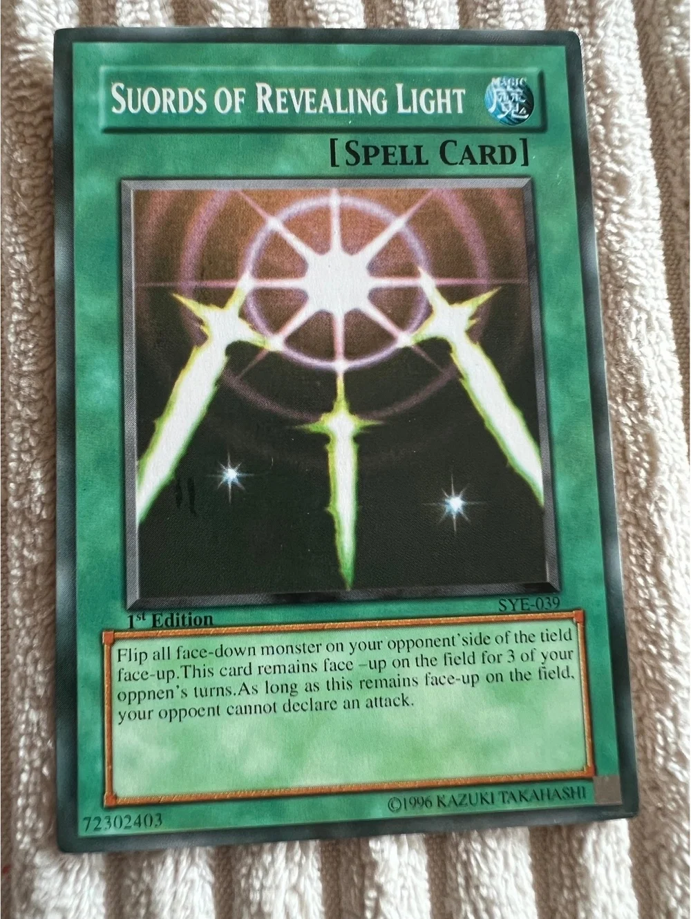 Yu-Gi-Oh! 1st Edition Super Rare Suords  swords of Revealing Light misspelling